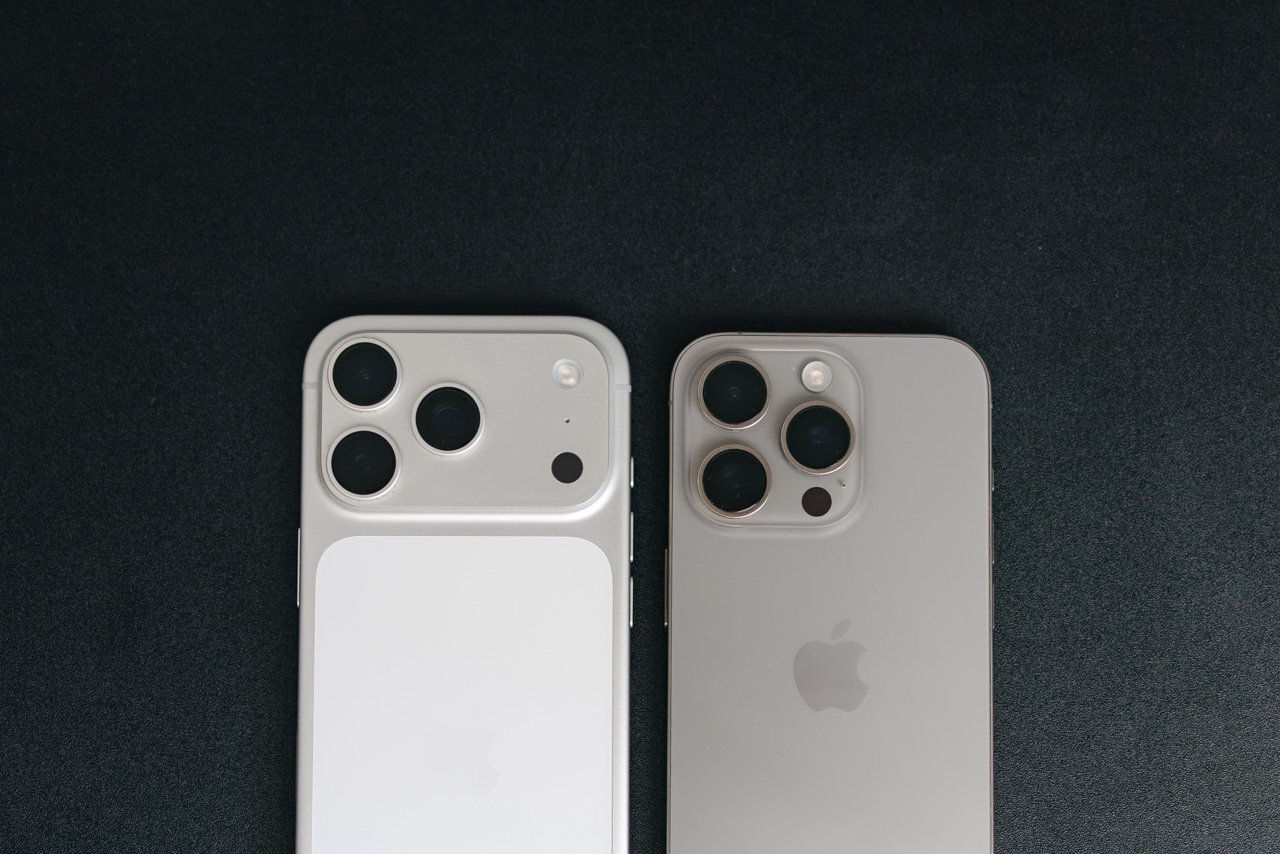 iPhone 17 Pro and 15 Pro lying next to each other on dark background